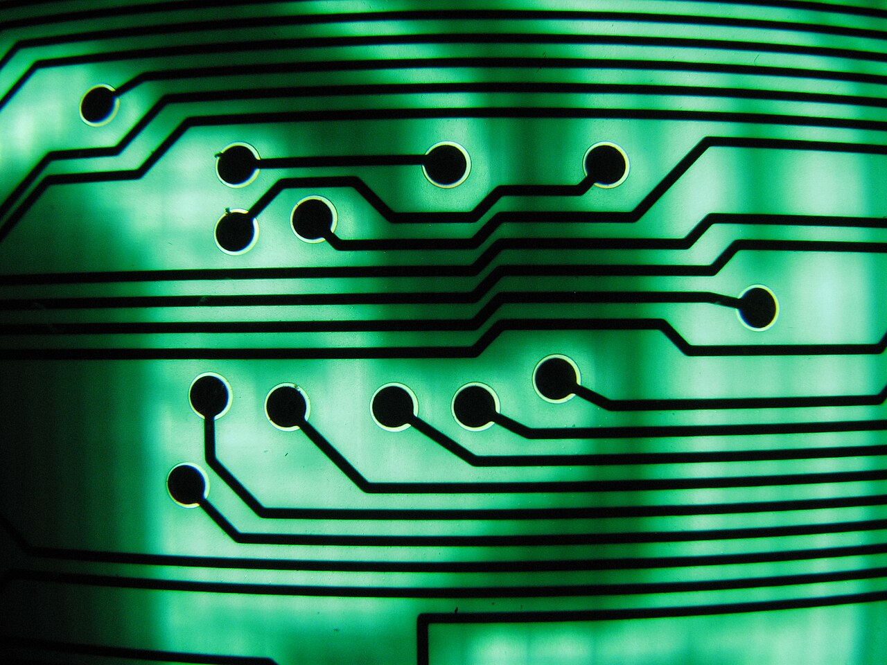 Detailed view of circuit board traces showing deliberate engineered routing