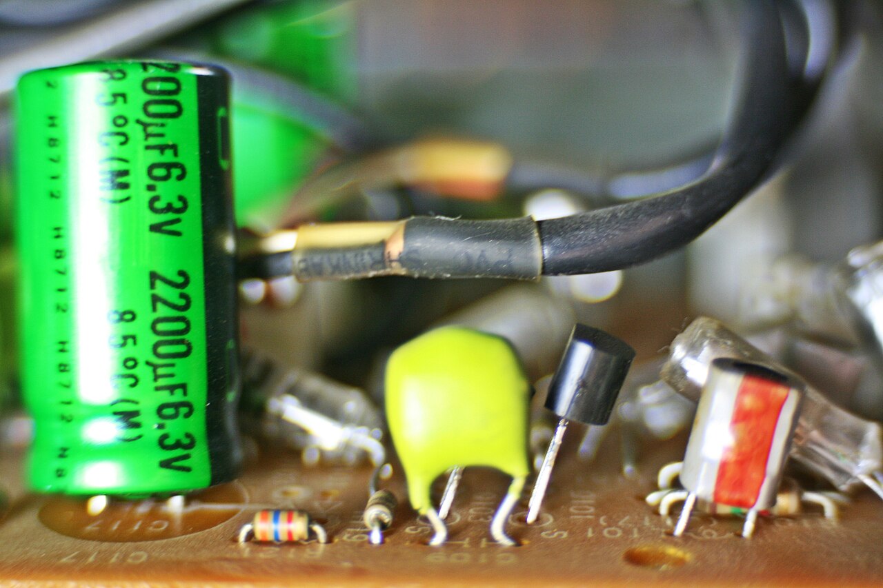 Close macro view of a printed circuit board showing copper traces and component solder joints